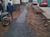 Po opravení ležaté kanalizace byla provedena do vyspádovaného a zhutněného terénu betonáž koryta.